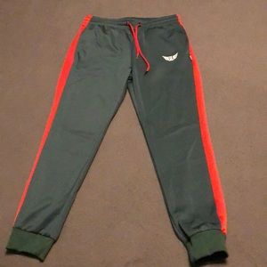 Size Up Supplements green W/ red stripe joggers